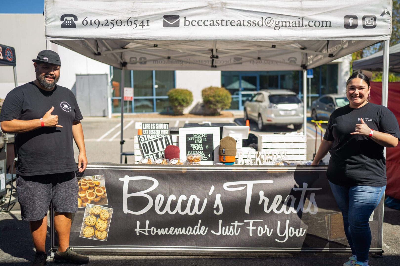Outdoor stall selling homemade jams called Becca's Treats.