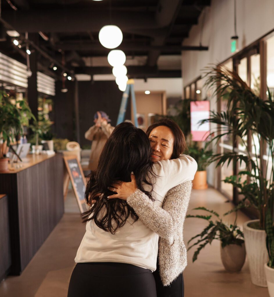 Warm hug in bright lobby space